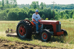 Bob McCart out mowing for the plow guys.