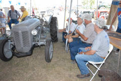 Phil Fenner of Kent, Washington, and Jeff Miller of Goshen, Ohio, holding a clinic showing how to determine engine compression, using Jeff's 1948 Ferguson TE-20.