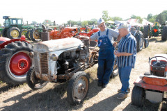 Mark Wendl of Edgar, Nebraska, brought this tractor that was purchased in France. It contains a one-cylinder two-cycle diesel CLM engine. The one cylinder has two opposing pistons in it which simultaneously compress the fuel-air mixture.